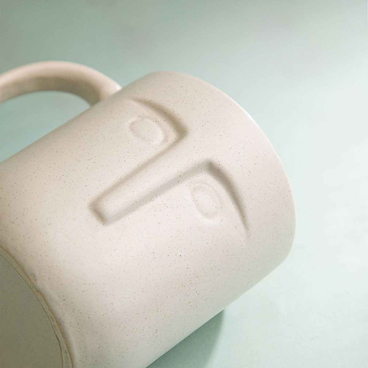Sculpted Face Ceramic Coffee Mug