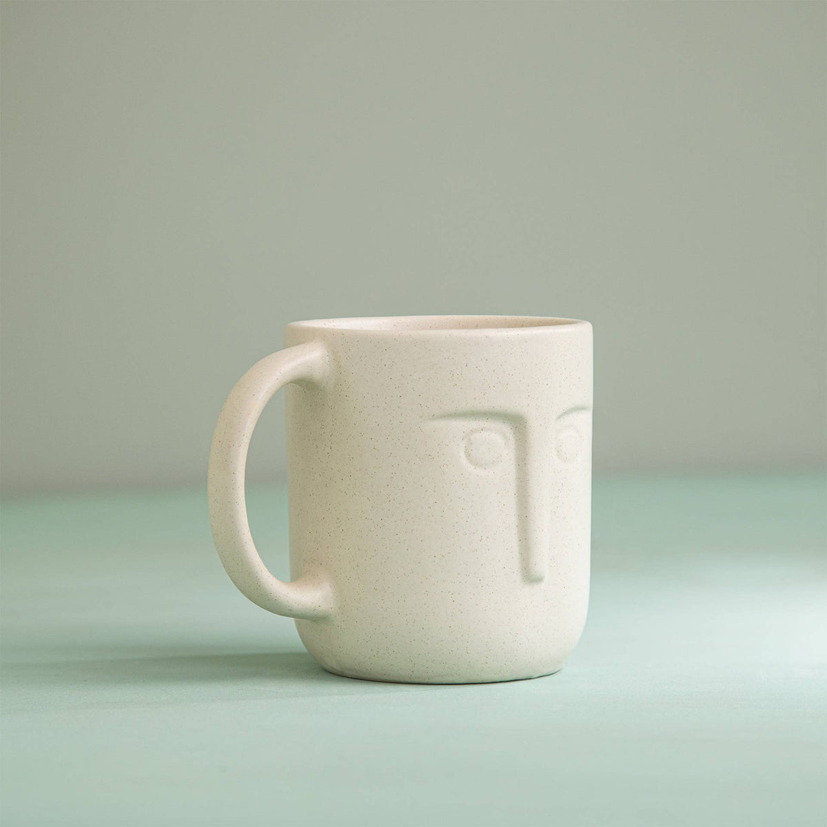 Sculpted Face Ceramic Coffee Mug